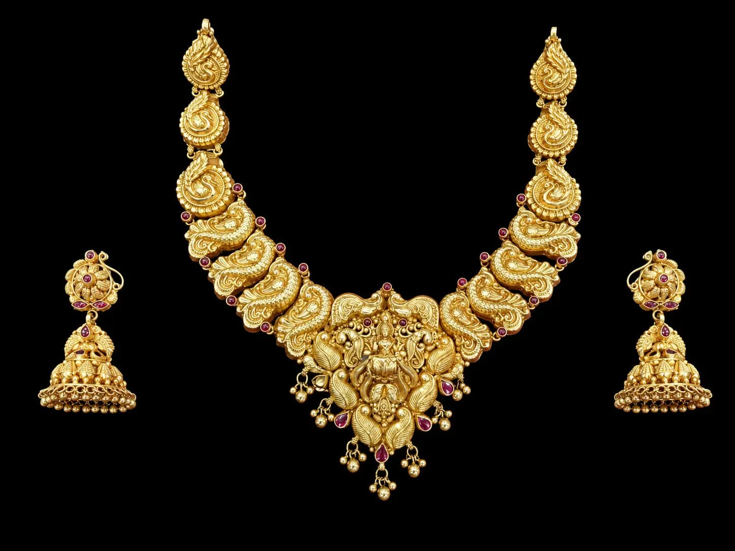 Gold temple necklace and matching jhumkas