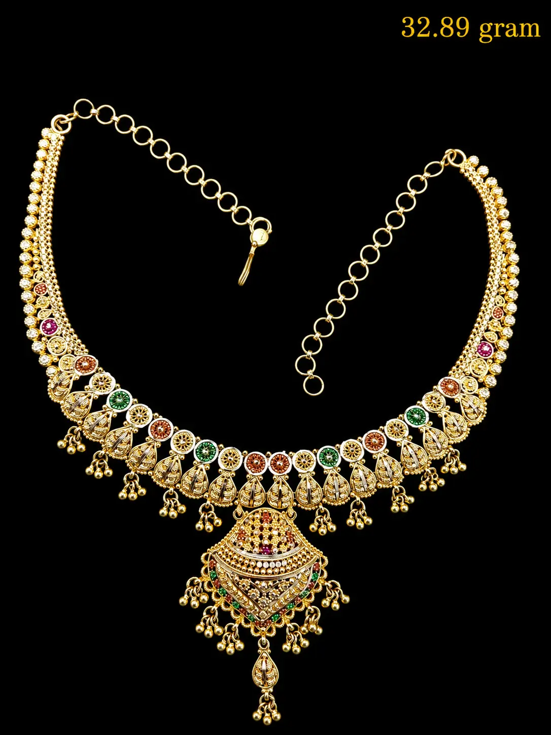 Gold necklace with jeweled centerpiece