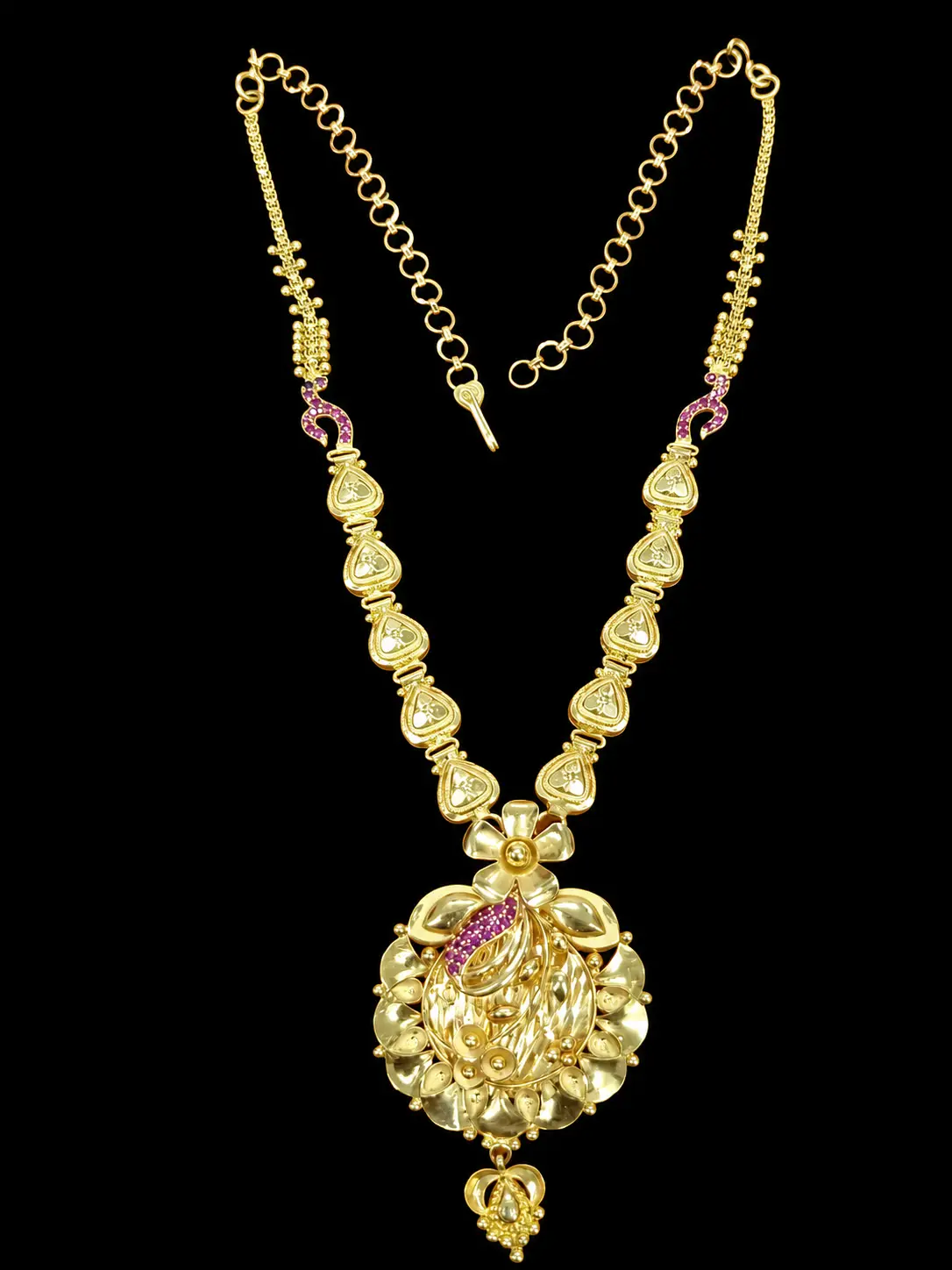 Gold floral necklace on pure