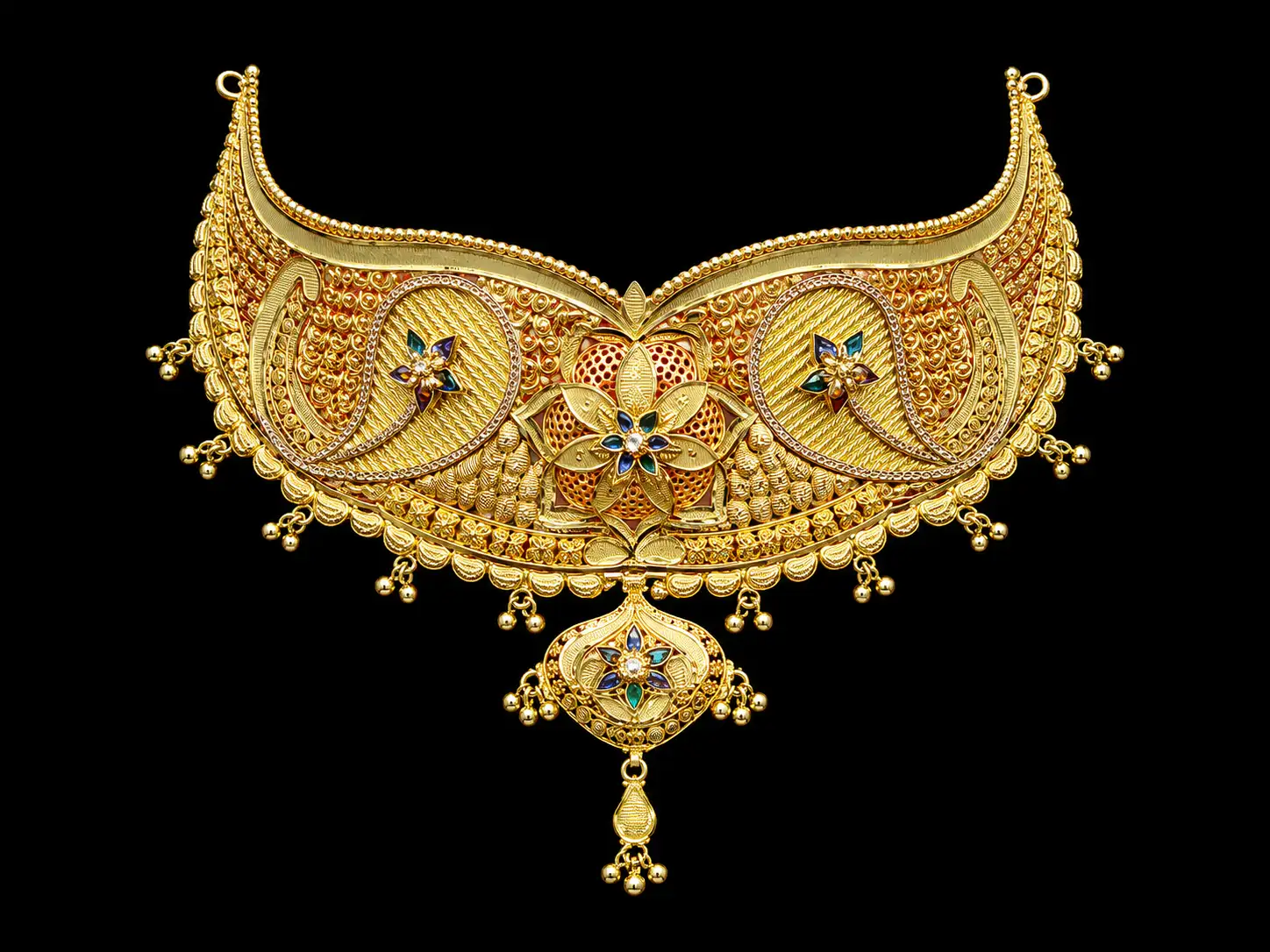 Ornate gold choker on pure